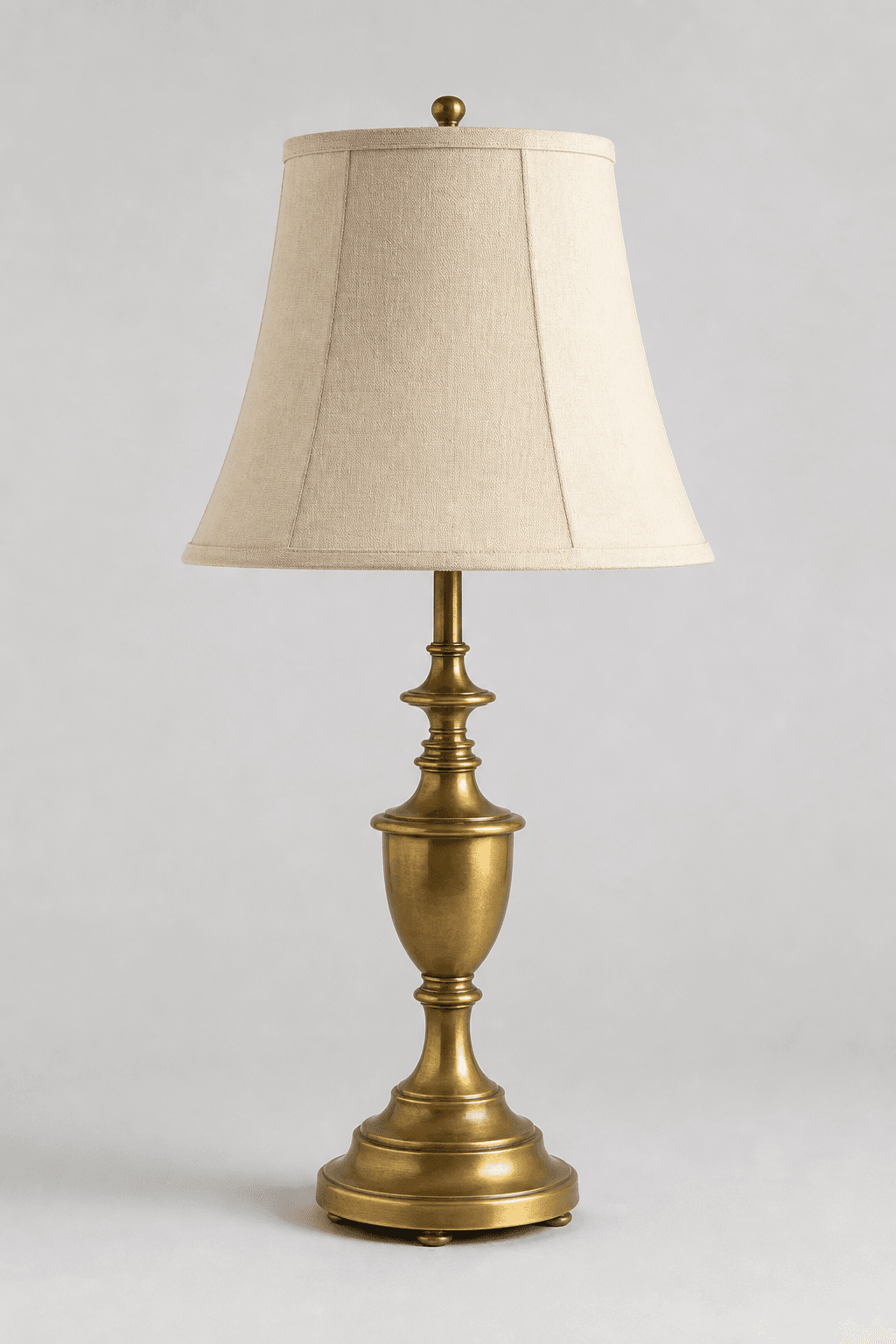 Vintage brass table lamp with a fabric shade